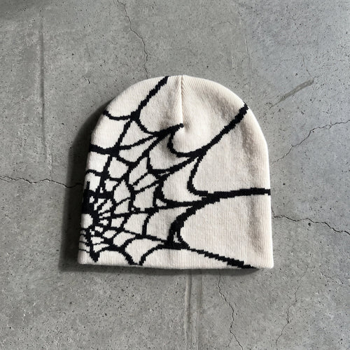 Bone and black spider-web beanie