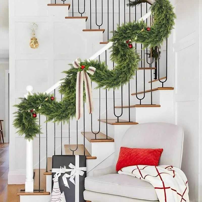Artificial Christmas garland decorating staircase